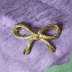 Twisted Ribbon Gold Tone Bow Brooch